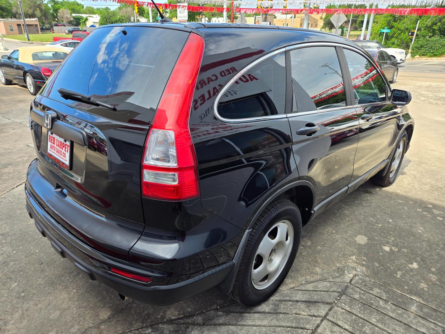 2010 Black Honda CR-V LX 2WD 5-Speed AT (5J6RE3H38AL) with an 2.4L L4 DOHC 16V engine, 5-Speed Automatic transmission, located at 503 West Court, Seguin, TX, 78155, (830) 379-3373, 29.568621, -97.969803 - 2010 Honda CR-V LX 2WD with a 2.4L L4 DOHC 16V, Automatic, Tilt, Cruise, AM/FM/CD/AUX Stereo, Power Windows, Locks and Side Mirrors, Tinted Windows, Alloy Wheels, Rear Wiper, Rear Defroster and more!! - Photo#2